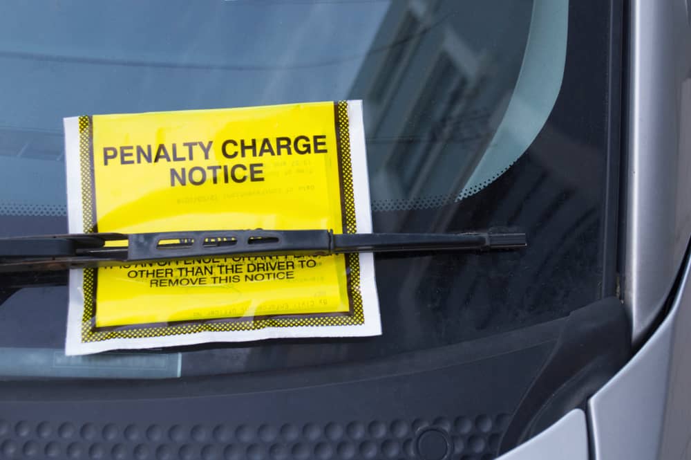 Car window with penalty notice charge