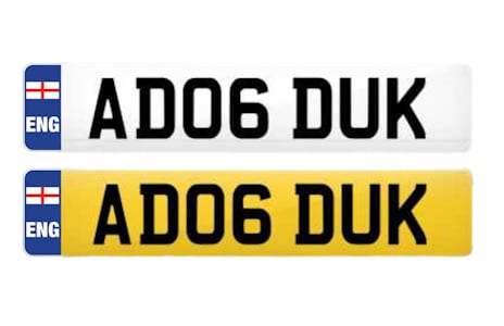 White and yellow number plates reading AD06 DUK